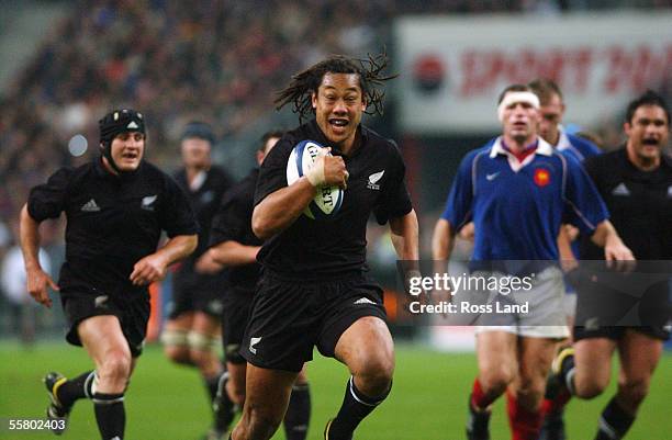 Tana Umaga sprints to the line to score under the posts, during the 2020 draw All Black V France rugby test at Stade De France, Paris, Saturday.