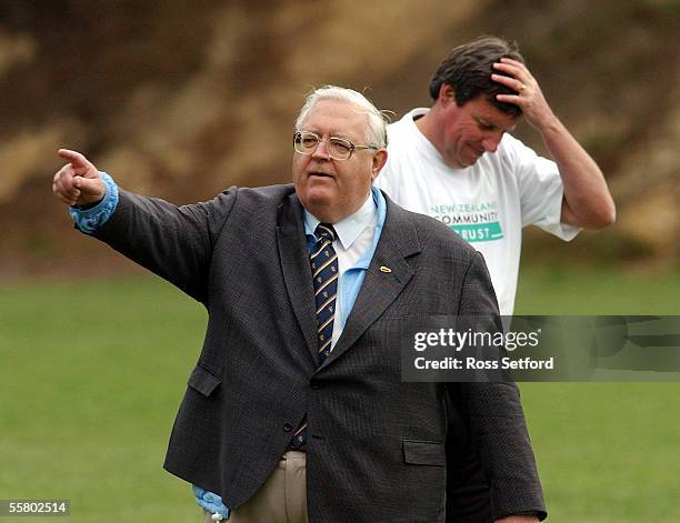 Speaker of the House Jonathon Hunt as umpire signals a no ball by New Zealand Cricket CEO Martin Snedden, rear, in a match between a MP's XI and a...