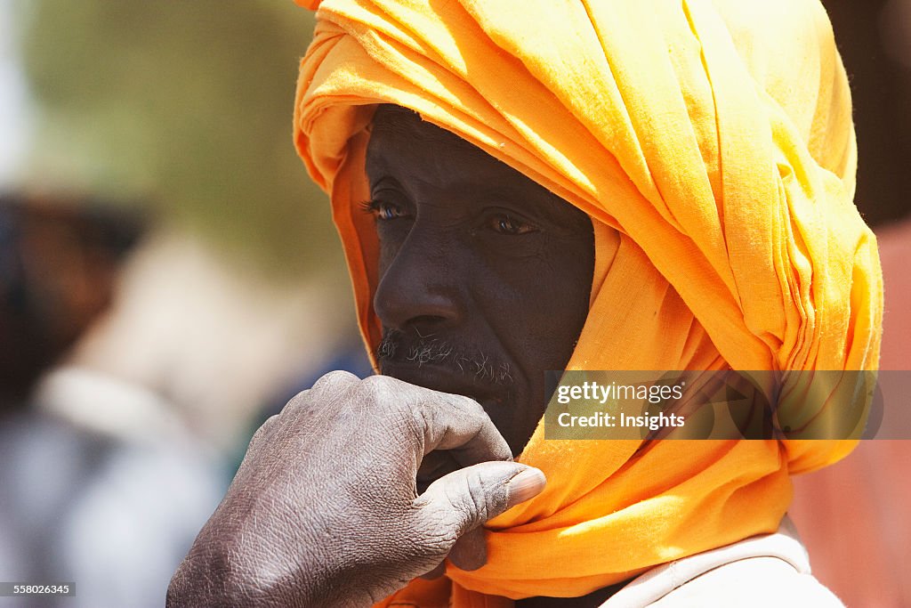 Man wearing a turban at the Monday Market in Djenne, Mali