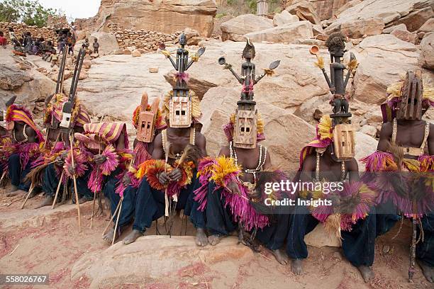 Dancers wearing Kananga mask at the Dama celebration in Tireli, Mali