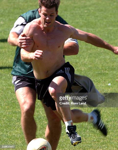 Steve Devine kicks the ball during a game of soccer during training at Bob Jane Stadium in Melbourne two days after the All Blacks 1022 loss to the...