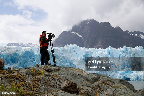 Videographer In Front Of The San Rafael Glacier, Laguna San Rafael National Park, Aysen Region, Chile