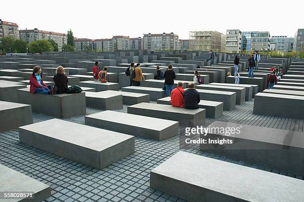 People At The Memorial To The Murdered Jews Of Europe, Berlin, Germany