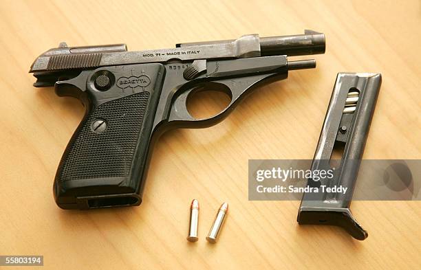 The Barretta semiautomatic pistol that was found loaded next to one of the sleeping gang members who has been arrested in conjunction with Operation...