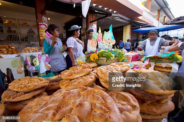 Women Selling Tortas De Comadres At The Jueves De Comadres Market During Carnaval Chapaco, Tarija, Bolivia