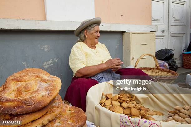 Woman Selling Tortas De Comadres At The Jueves De Comadres Market During Carnaval Chapaco, Tarija, Bolivia