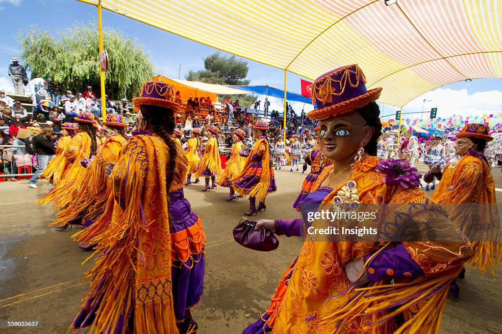 Morenada Dancers Wearing Masks In The Procession Of The Carnaval De Oruro, Oruro, Bolivia