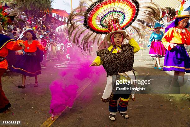 Suri Sicuri Dancers Wearing Elaborate Feather Headdress In The Procession Of The Carnaval De Oruro, Oruro, Bolivia