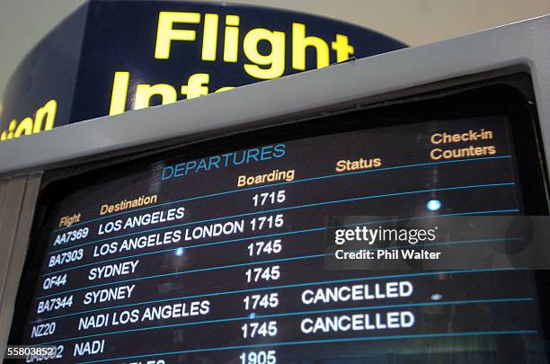 The departure screens show several cancelled flights out of Auckland at the International Airport in Auckland, New Zealand, Monday, July 18th, 2005....