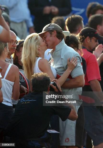 Alinghi Syndicate Head Ernesto Bertarelli kisses his wife Kirsty after Switzerland's Alinghi won of the Louis Vuitton Cup in Auckland, Sunday....