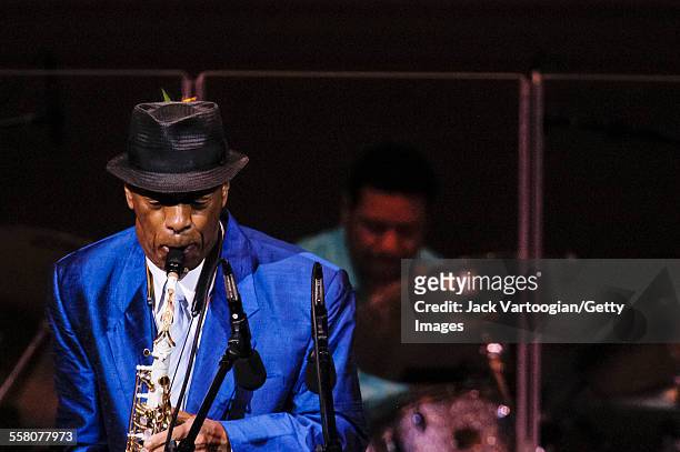 American Jazz musician Ornette Coleman plays alto saxophone with his trio onstage at a JVC Jazz Festival concert at Carnegie Hall, New York, New...