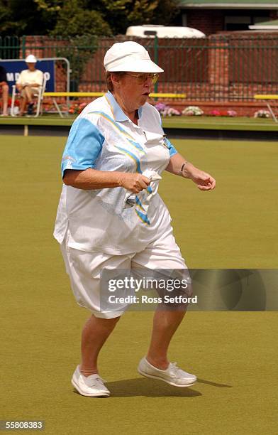 Maureen Parker, skip of the New Lynn Bowling Club's womens four, of Hetty Bolscher, Norma Stewart and Janis Scott, runs down the green on the way to...