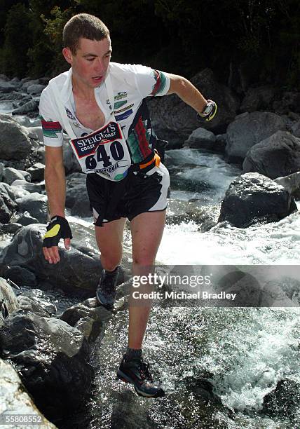 Luke Vaughan makes his way over rock as part of the Mountain run stage during the two day event at the 2004 Speights Coast to Coast, Kumara New...