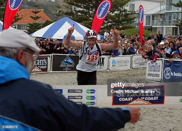 George Christison is greeted by Robin Judkins as he wins the longest day event at the 2004 Speights Coast to Coast, Kumara New Zealand, Saturaday,...