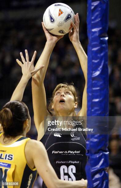 Silver Ferns Irene Van Dyk looks to shot over Australian Liz Ellis during the first Fisher and Paykel netball test between the Silver Ferns and...