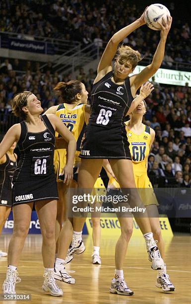 Silver Ferns Irene Van Dyk reaches for the loose ball during the first Fisher and Paykel netball test between the Silver Ferns and Australia played...