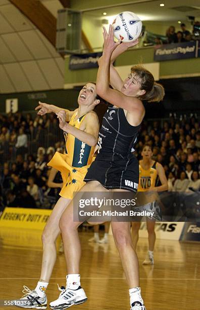 Silver Fern Irene Van Dyk competes with Australian Janine Ilitch during the second Fisher and Paykel test match between the Silver Ferns and...