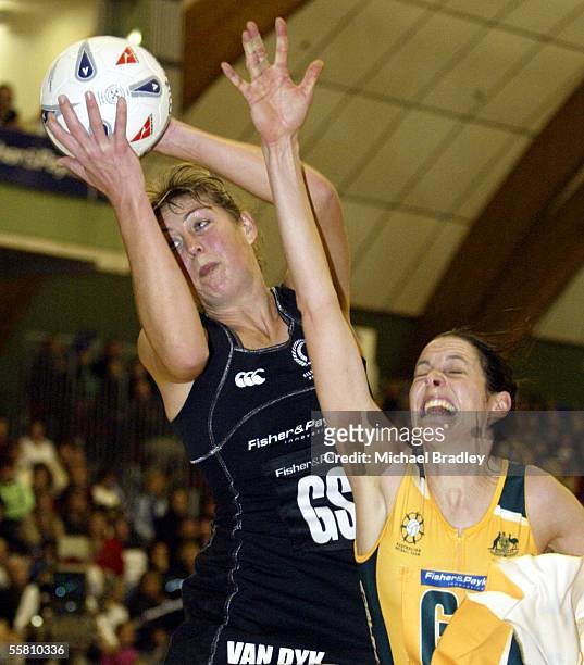 Silver Fern Irene Van Dyk isecures the ballahead of Australian Janine Ilitch during the second Fisher and Paykel test match between the Silver Ferns...