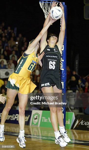 Silver Fern Irene Van Dyk competes with Australian Demelza Fellowes during the third and last Fisher and Paykel netball test match bewteen the Silver...