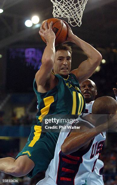 Australia's Jason Smith in action against the USA in their Mens Basketball match played at the Helliniko Indoor Arena at the Olympic Games in Athens,...