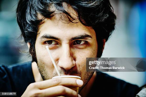 man drinking espresso - espresso drink stock pictures, royalty-free photos & images