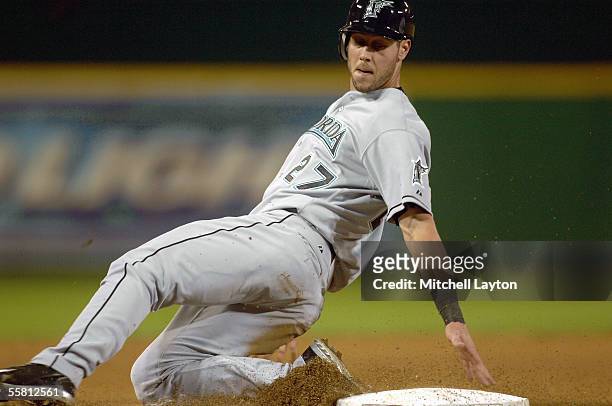 Jeremy Hermida of the Florida Marlins slides into second base during a game against the Washington Nationals on September 6, 2005 at RFK Stadium in...