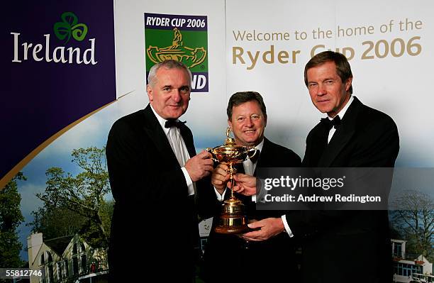 Bertie Ahern , Ian Woosnam and George O'Grady pose with the Ryder Cup trophy during The One Year To Go Ryder Cup Gala Dinner at Citywest Hotel and...