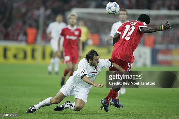 Armand Deumi of FC Thun holds off a challenge from Karol Kisel of Sparta Prague during the UEFA Champions League match between FC Thun and Sparta...