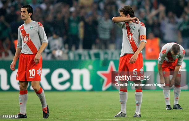 Johan Micoud, Frank Baumann and Leon Andreasen of Werder looks dejected during the UEFA Champions League Group C match between Panathinaikos Athens...