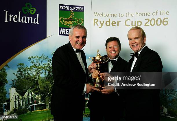 Bertie Ahern , Ian Woosnam and James Kenny pose with the Ryder Cup trophy during The One Year To Go Ryder Cup Gala Dinner at Citywest Hotel and Golf...