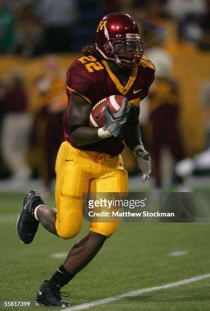 Laurence Maroney of Minnesota carries the ball against Purdue on September 24 2005 at the Hubert H Humphrey Metrodome in Minneapolis, Minnesota....