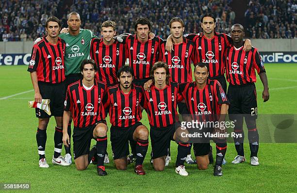 The AC Milan team pose for photographers ahead the UEFA Champions League Group E match between FC Schalke 04 and AC Milan at the Veltins Arena on...