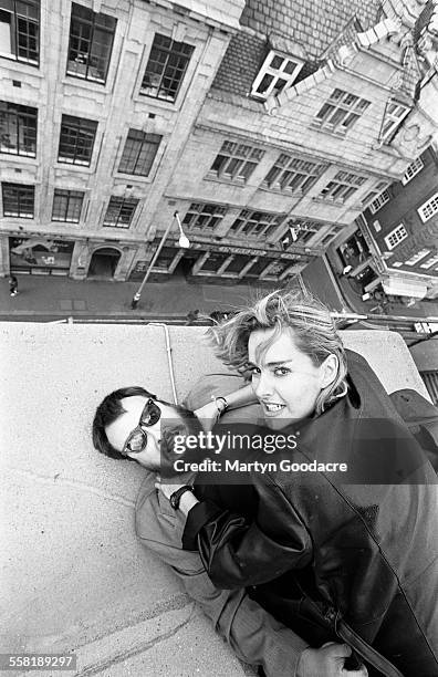 Spanish director and screenwriter Alex De La Iglesia poses with actress Frederique Feder, London, United Kingdom, 1993.