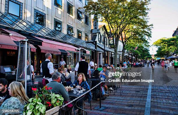 Burlington, Vermont, Church Street downtown with restaurants and tourists outdoors at café