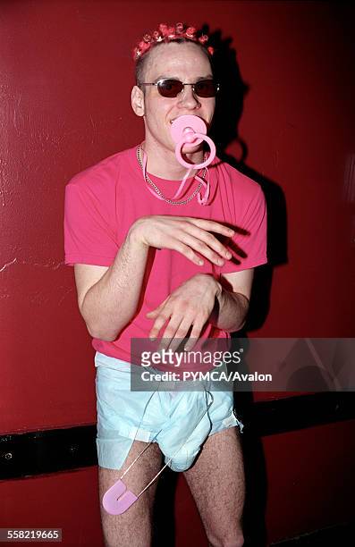 Clubber wearing a nappy with a dummy in his mouth, Stomp, Fridge, London, 2002.