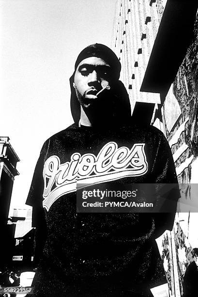 Rapper Nas posing in New York, USA 1990's.