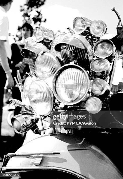 Lights on the front of a vespa. Isle of wight scooter rally, August 2002.