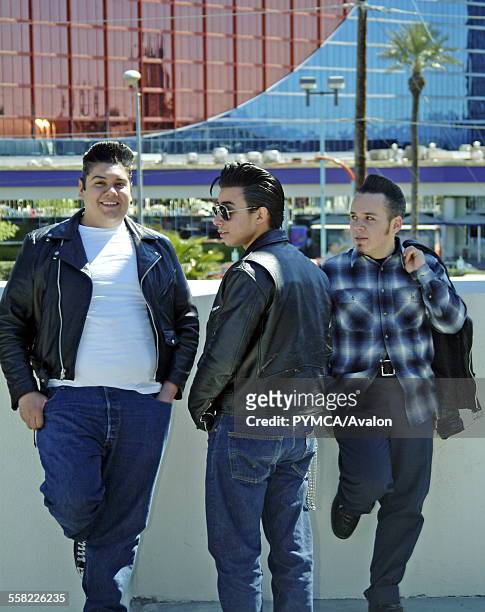Young rockabillies boys in jeans and leather jackets, Viva Las Vegas Festival, Las Vegas, USA 2006..