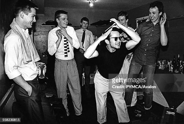 Ska, 2 Tone band, Madness, messing around backstage, UK 1980.
