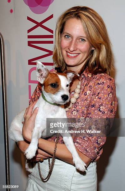 Celerie Kemble and her dog, Anchovy, attend the opening of the Intermix flagship store in SoHo September 28, 2005 in New York City.