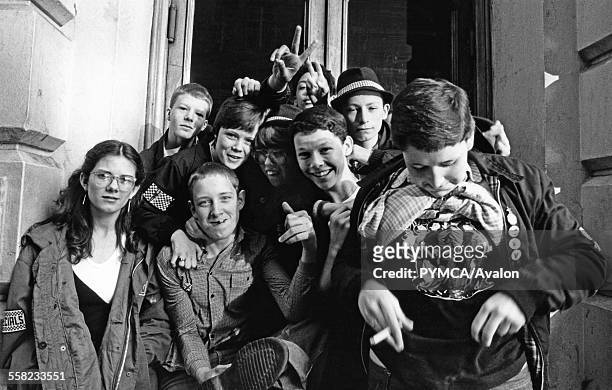 Group of kids, Ska, 2 Tone fans, gesturing, Coventry, UK 1980.