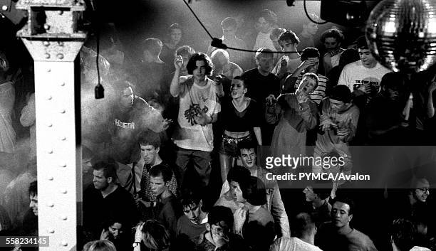 Ravers on the main stage in the Hacienda, Manchester 1989.