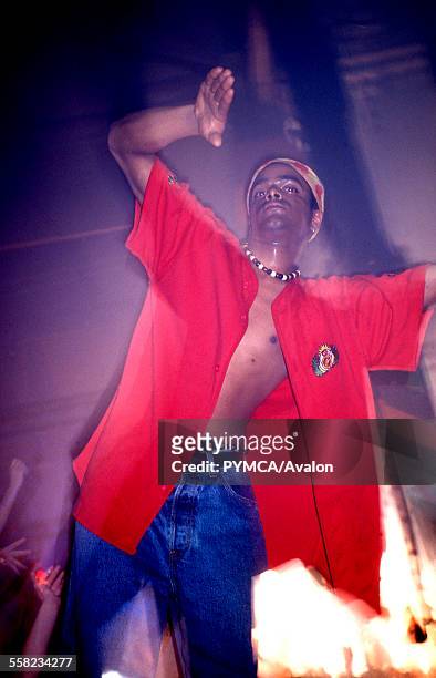 Clubber on the podium of the main dancefloor of the Hacienda, Manchester 1988.