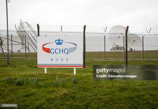 Satellite receiver dishes and sign for GCHQ facility near Bude, Cornwall