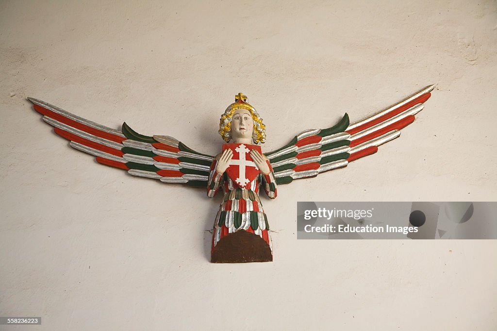 Wall mounted angel carving in Holy Trinity church Blythburgh Suffolk England