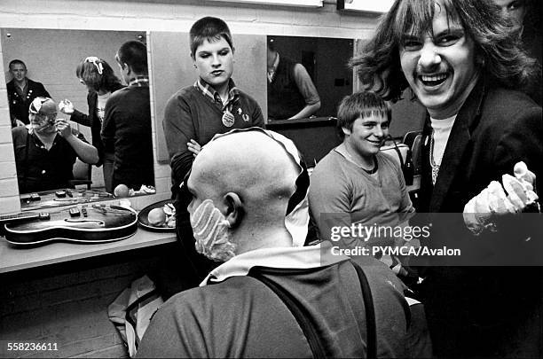 Buster Bloodvessel of Ska, 2 Tone band, Bad Manners, having his head shaved backstage, UK 1980.