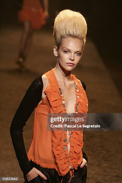 Model walks the runway at John Richmond's Spring/Summer 2006 women's collection during Milan's fashion week on September 27, 2005 in Milan.