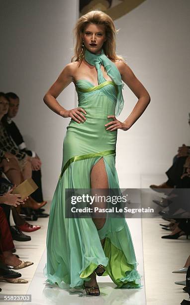 Model walks the runway at Valentin Yudashkin's Spring/Summer 2006 women's collection during Milan's fashion week on September 28, 2005 in Milan.