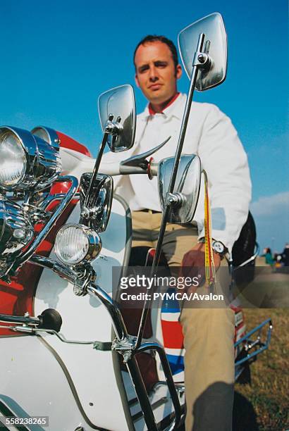 Mod sitting on his scooter, 2000s.