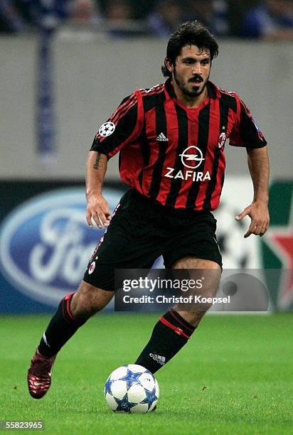 Gennaro Gattuso of Milan runs with the ball during the UEFA Champions League Group E match between FC Schalke 04 and AC Milan at the Veltins Arena on...